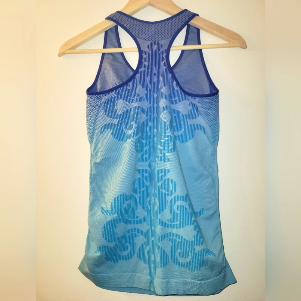 C elimatewear Blue Activewear Top with back design and built-in bra, Size M.